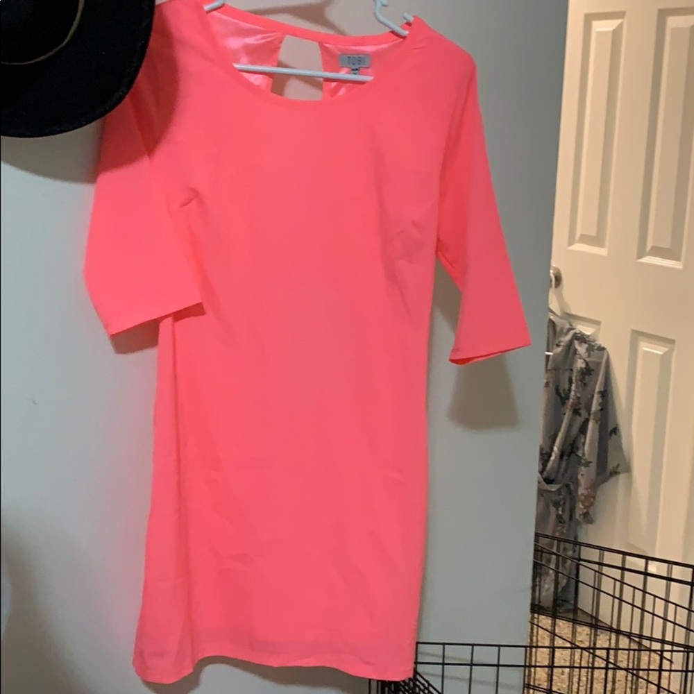 Neon pink knee length dress